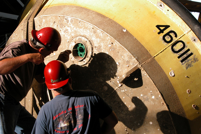  Technicians preparing 3-Meter Buoy for sub-surface instrumentation NDBC