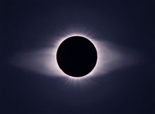 The solar corona, which produces solar wind, is evident in this eclipse. The solar corona, which produces solar wind, is evident in this eclipse.