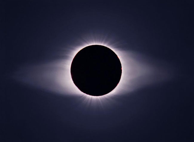 The solar corona, which produces solar wind, is evident in this eclipse.