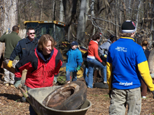 Volunteers removing debris at the February 2006 Watts Branch clean-up Volunteers removing debris at the February 2006 Watts Branch clean-up