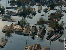 Photograph showing a neighborhood flooded after Hurricane Katrina. Photograph showing a neighborhood flooded after Hurricane Katrina.
