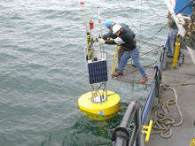 Early test buoy deployment during development of GLERL's Real-Time Environmental Coastal Observation Network (RECON). Early test buoy deployment during development of GLERL's Real-Time Environmental Coastal Observation Network (RECON).
