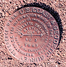 Brass marks permanently affixed indicate accurate geodetic reference positions Brass monuments permanently affixed in concrete or surrounding bedrock indicate accurate geodetic reference positions
